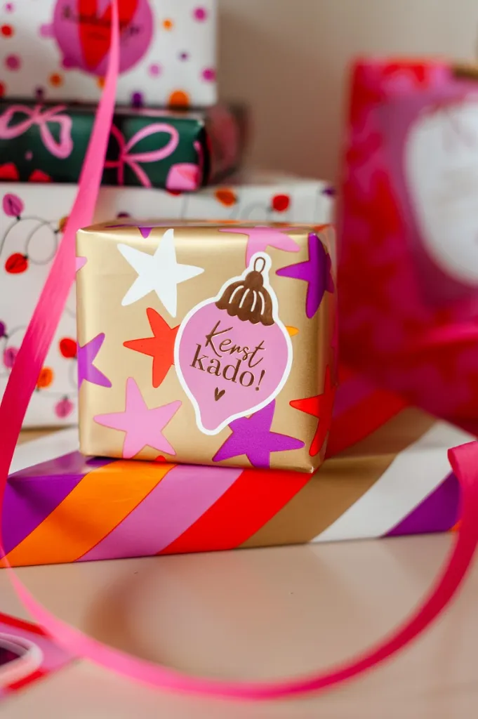 0035089_kp-cadeaupapier-100m-stars-goldmulticolor.webp